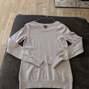 Cream sweatshirt with rhinestones.